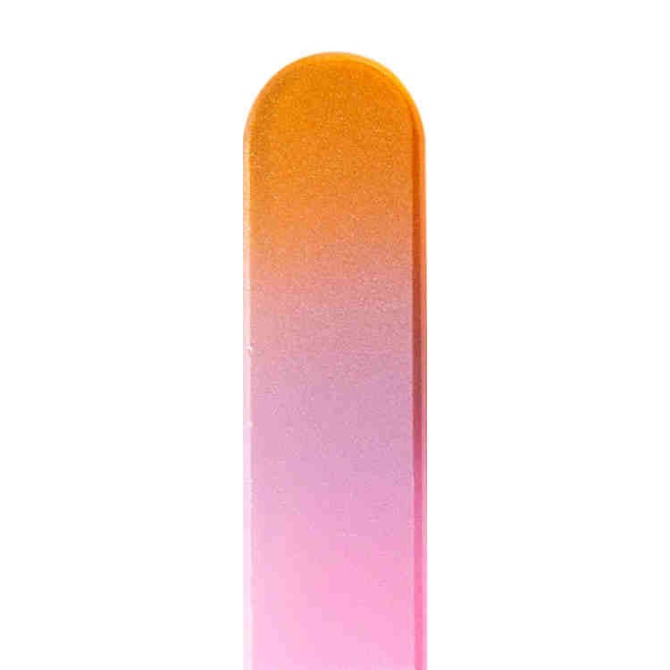 Gradient glass nail file stick from orange to pink on a white background