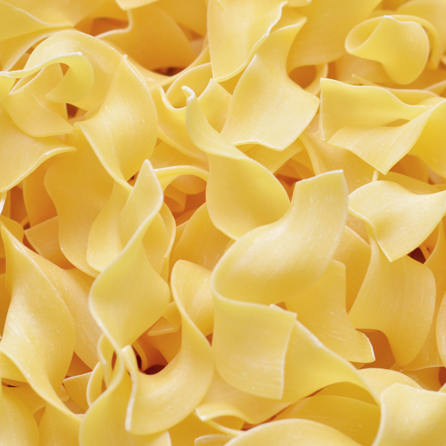 Close-up of uncooked yellow pasta