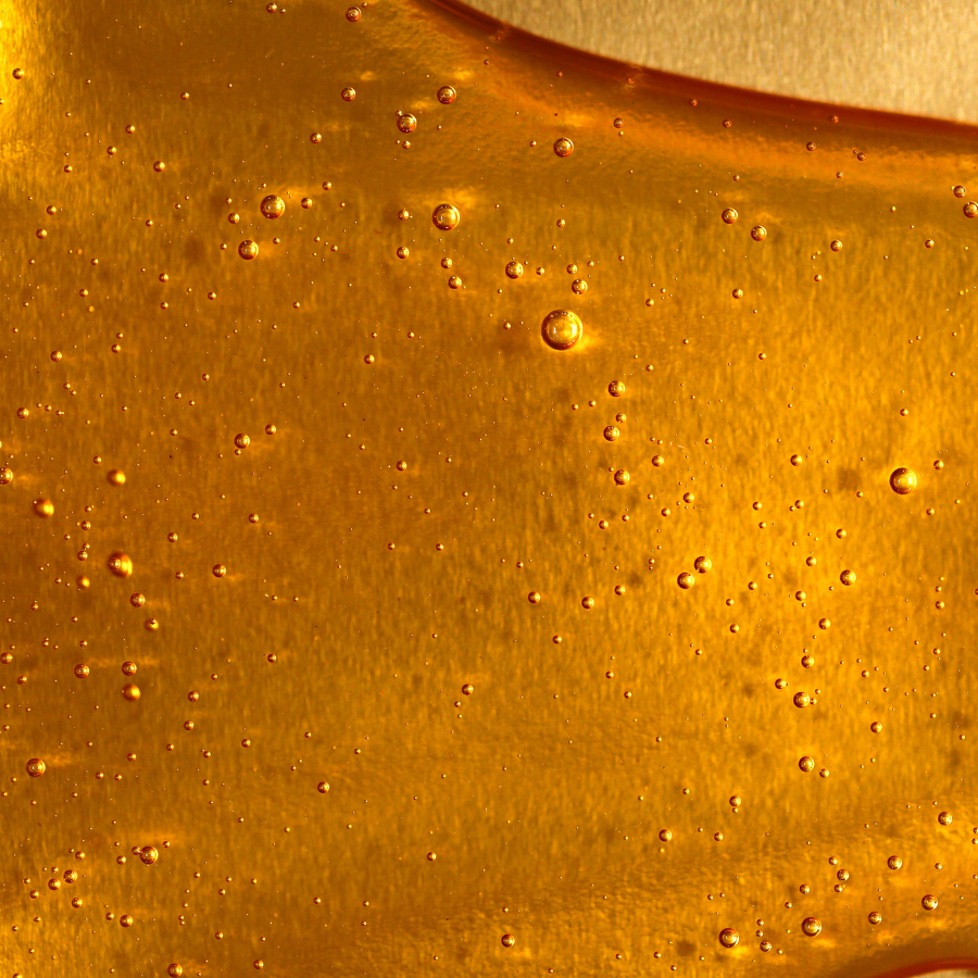 Close-up of honey with small bubbles