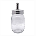 Clear glass jar with silver lid and spout on a white background