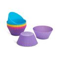 Set of colorful silicone cupcake liners on a white background