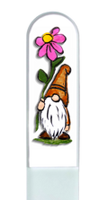 Decorative garden gnome with a pink flower on a white background