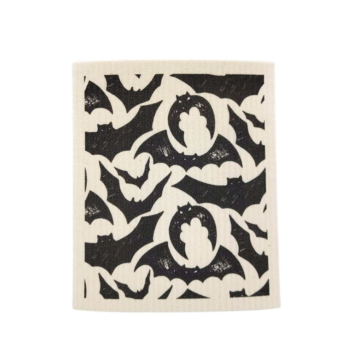 Decorative mat with black bat and moon design on a white background