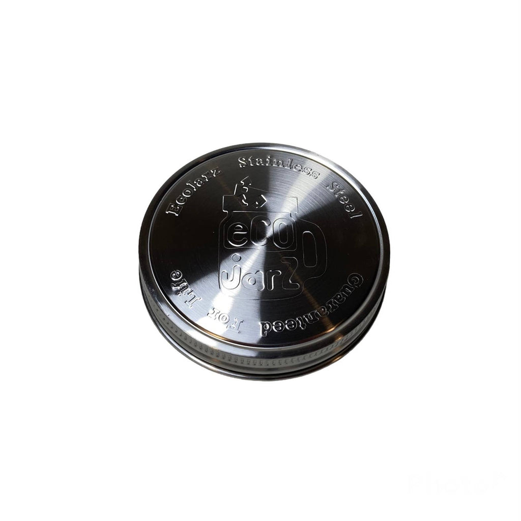 Metallic container lid with branding on a white background