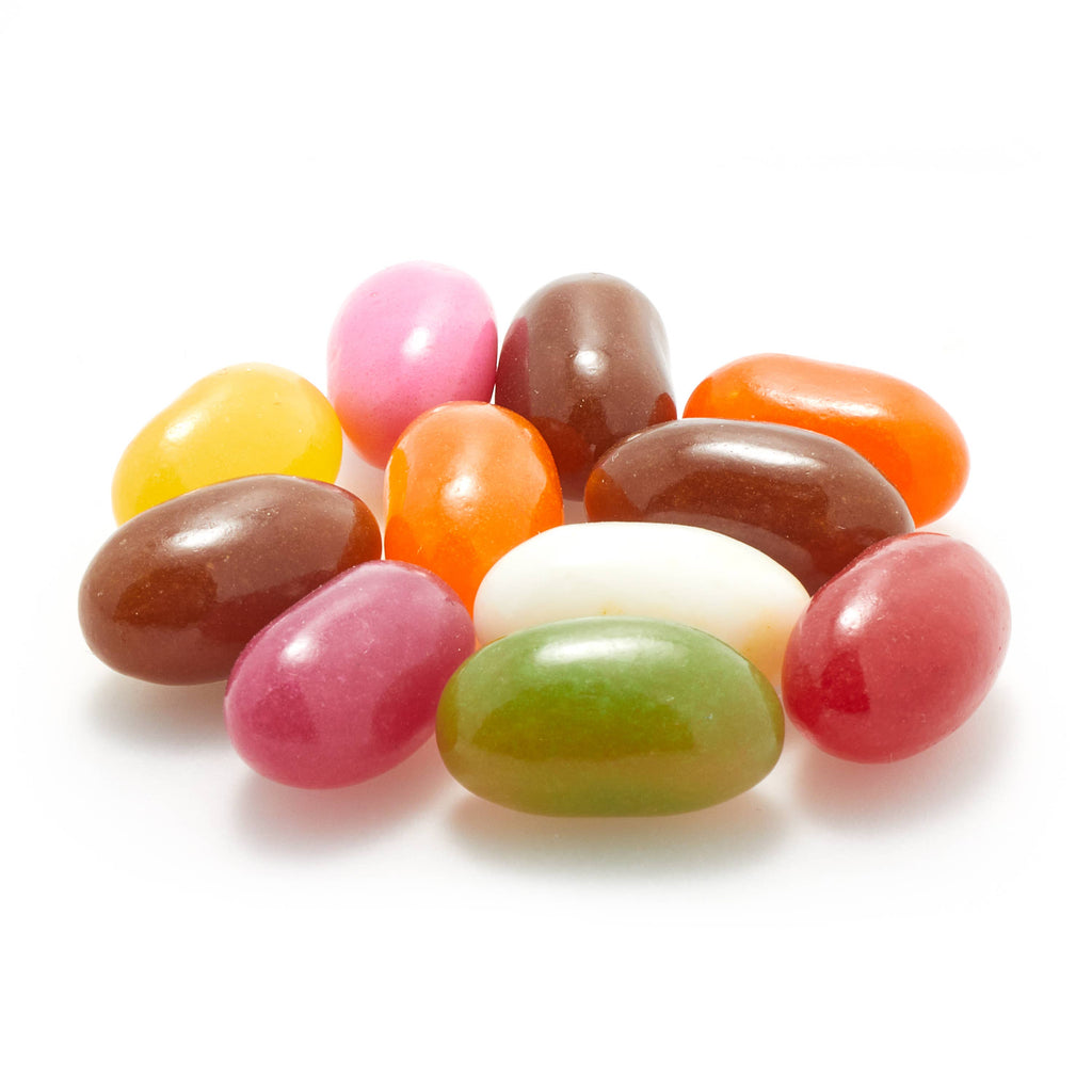 Assorted colorful jelly beans on a white background