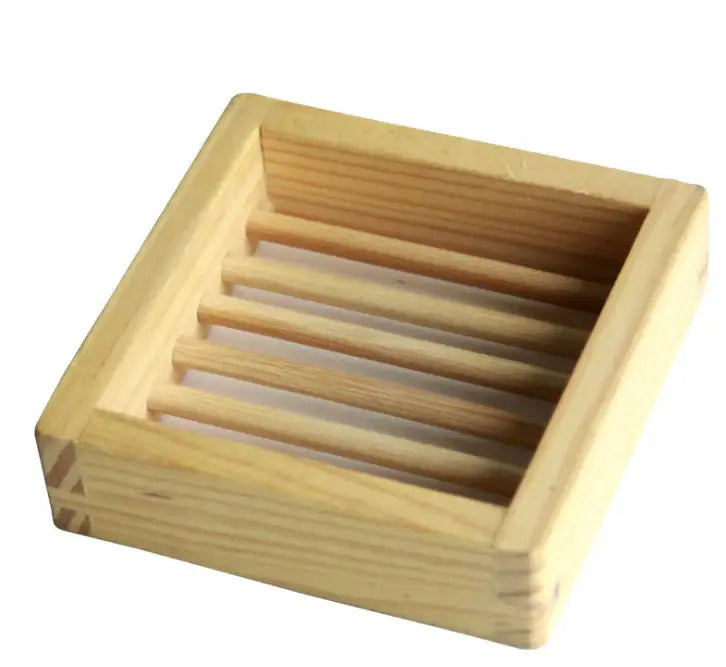 Wooden soap dish on a white background