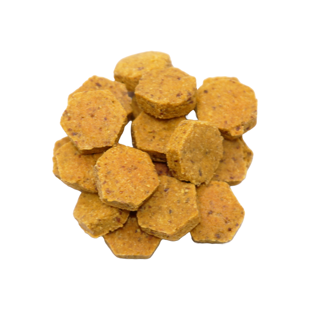Hexagonal dog/cat treats on a white background