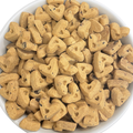 Heart-shaped dog treats in a white bowl