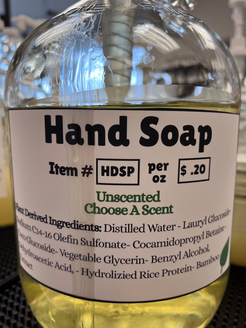 Hand soap bottle with label showing price and product details.