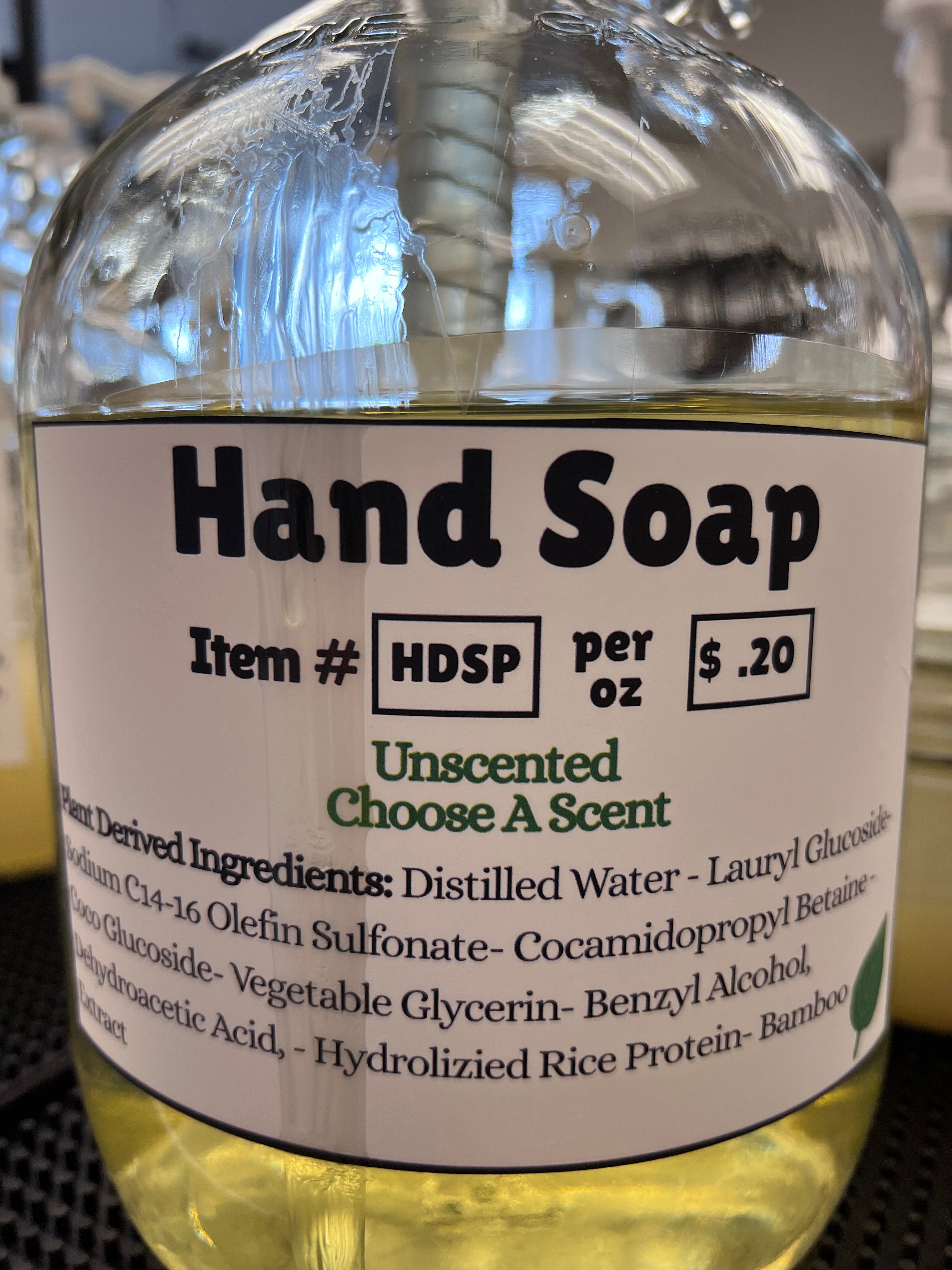 Hand soap bottle with label showing price and product details.