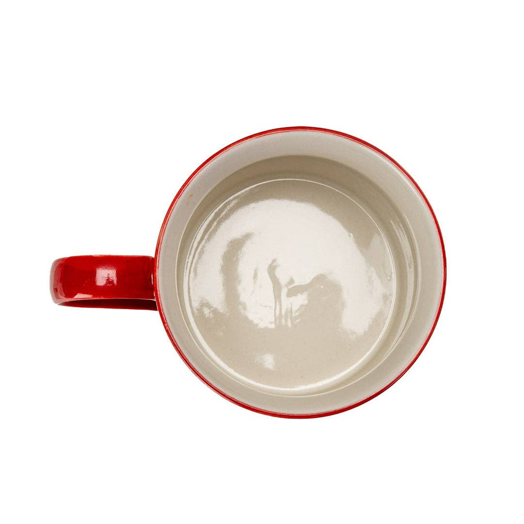 Red mug with a white interior on a white background