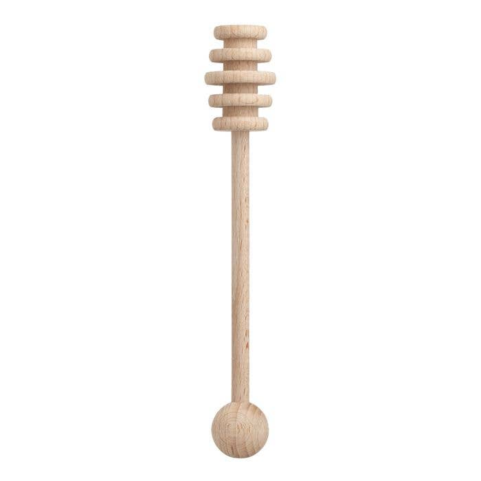 Wooden honey muddler with multiple tiers on a white background