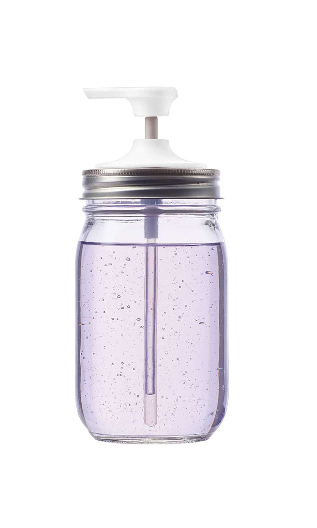 Clear mason jar with a white pump lid on a white background
