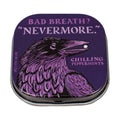 Tin of peppermints with a purple raven illustration and text on a white background