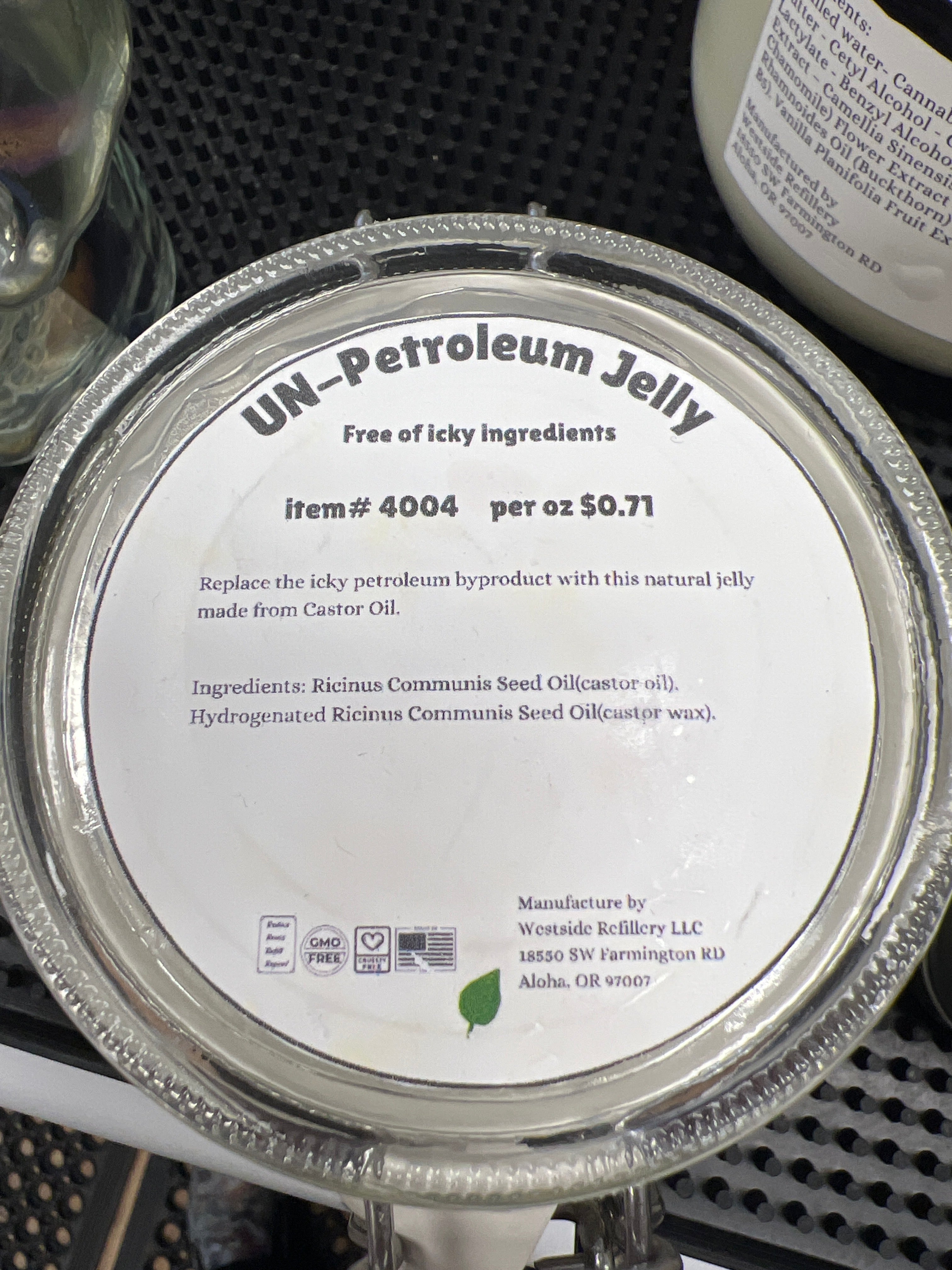 Close-up of a container lid with text and branding
