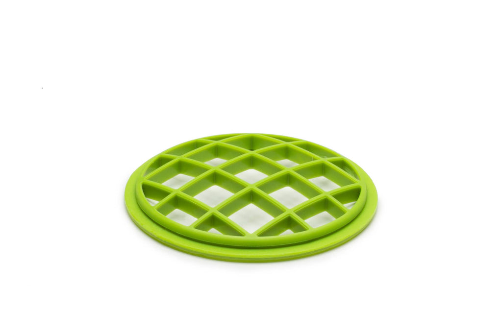Green plastic flower frog grid on a white background