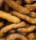 Close-up of brown sesame sticks  with a focus on texture