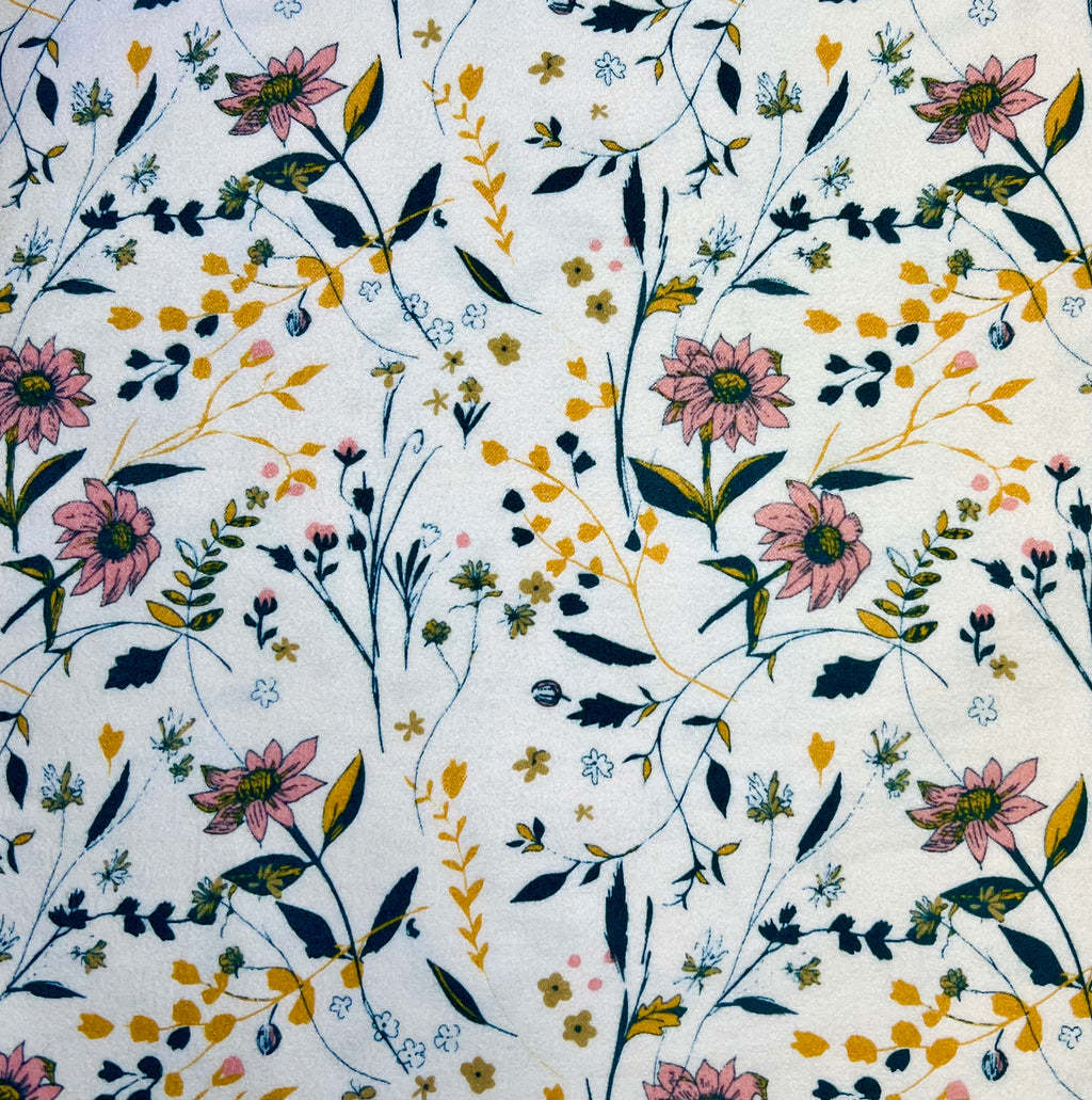 Floral pattern with pink, yellow, and green flowers on a white background