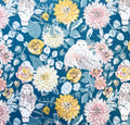 Floral and owl pattern on a blue background
