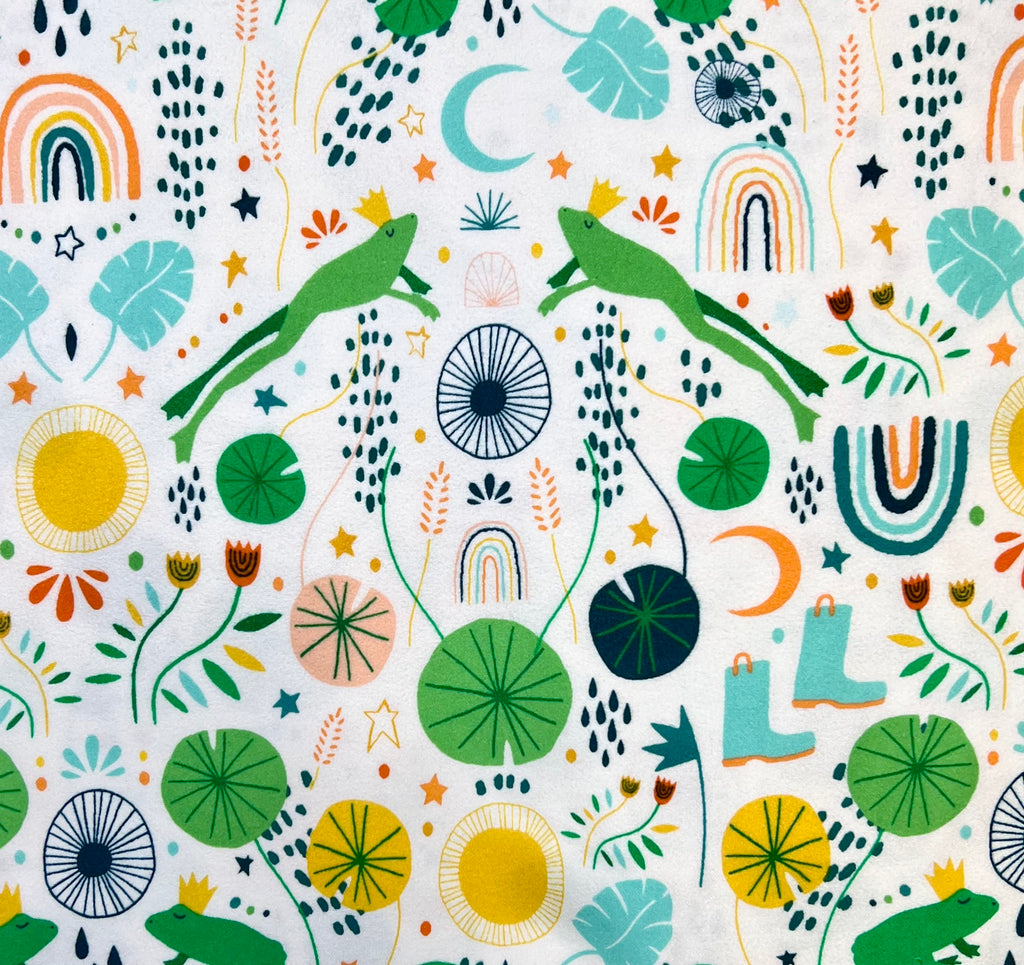 Colorful pattern with lizards, flowers, and abstract shapes on a white background