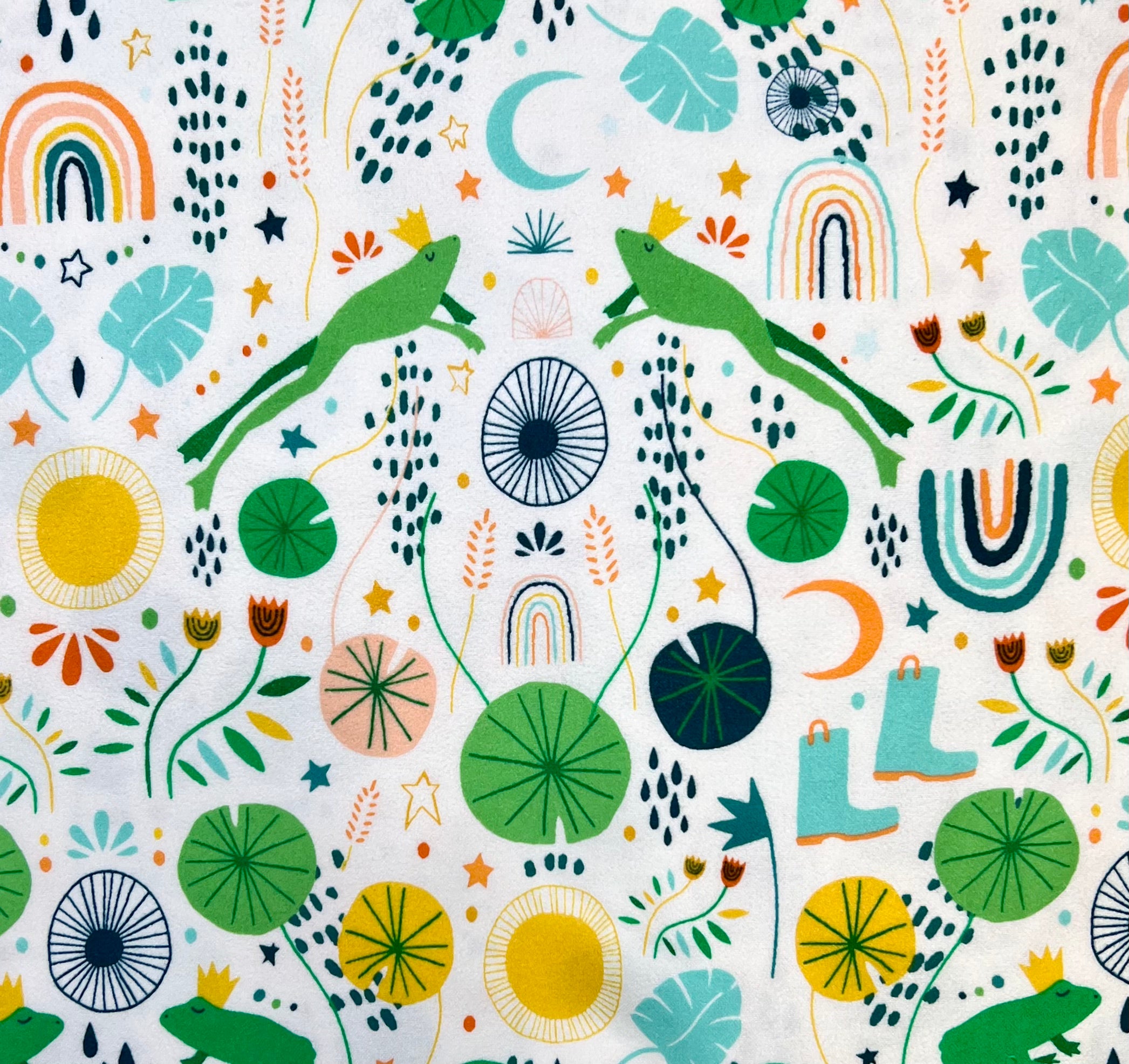Colorful pattern with lizards, flowers, and abstract shapes on a white background