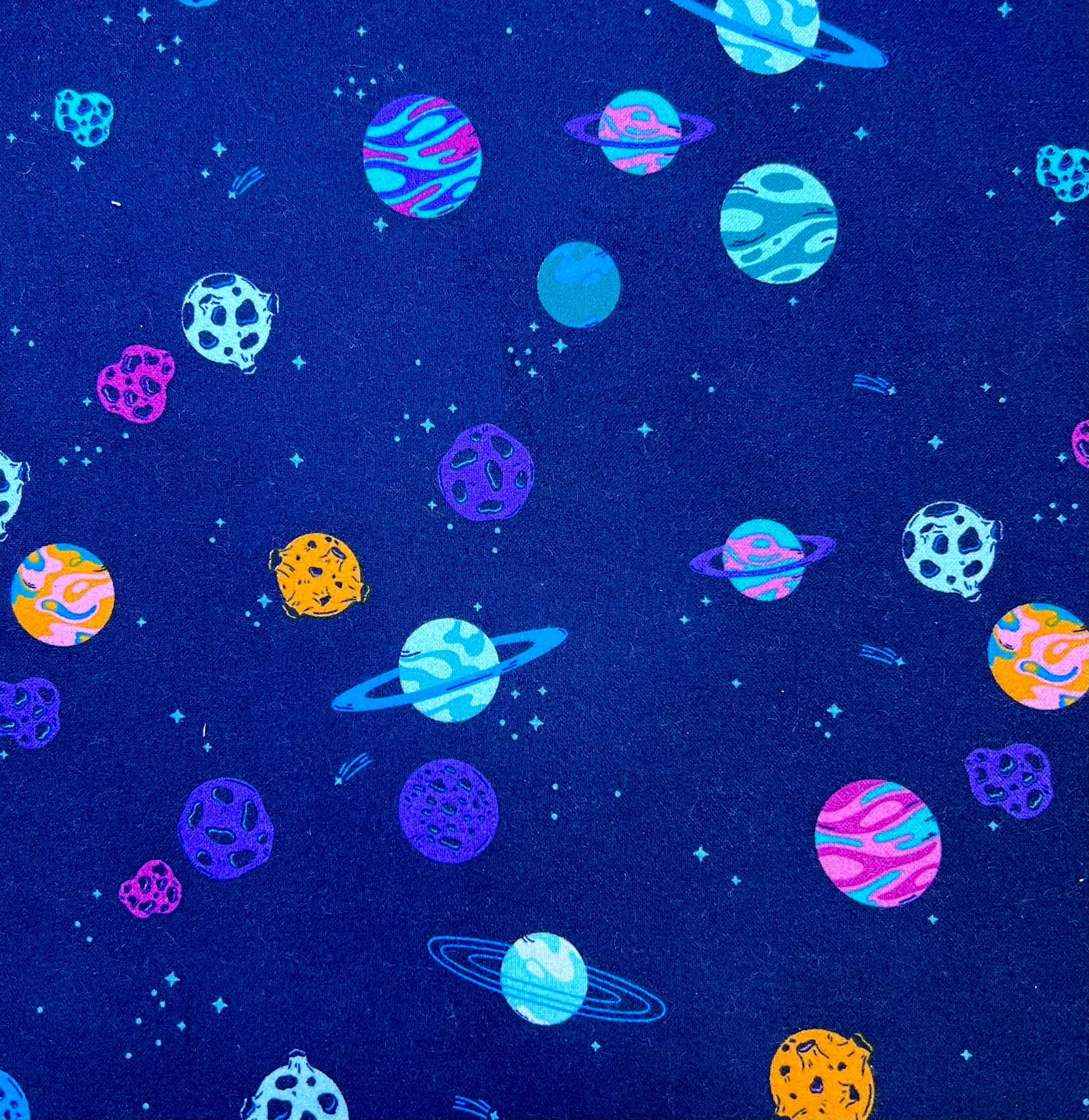 Colorful space-themed pattern on a blue background