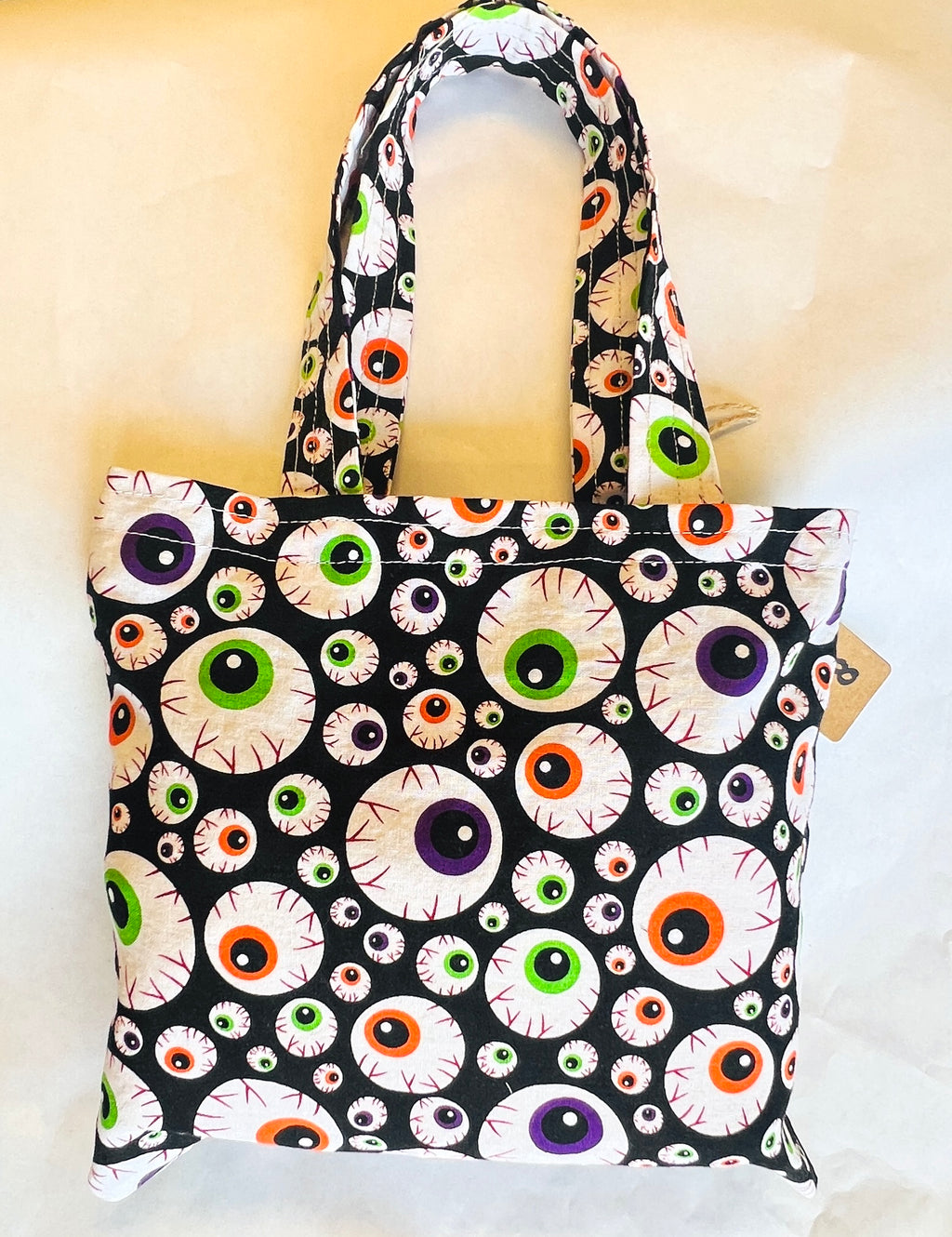 Eyeball fabric tote bag , white background 