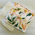 Pink flowers and greenery with white background fabric square sponge