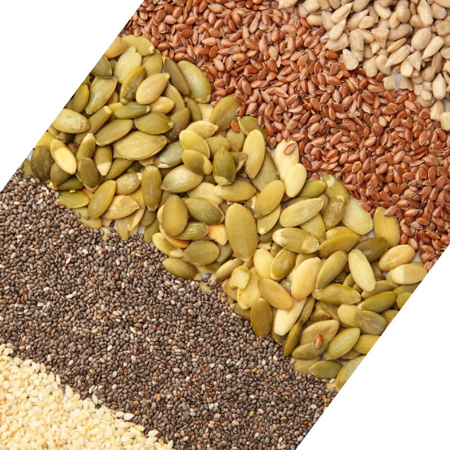Assorted seeds including chia, flax, and pumpkin seeds arranged in a pattern.