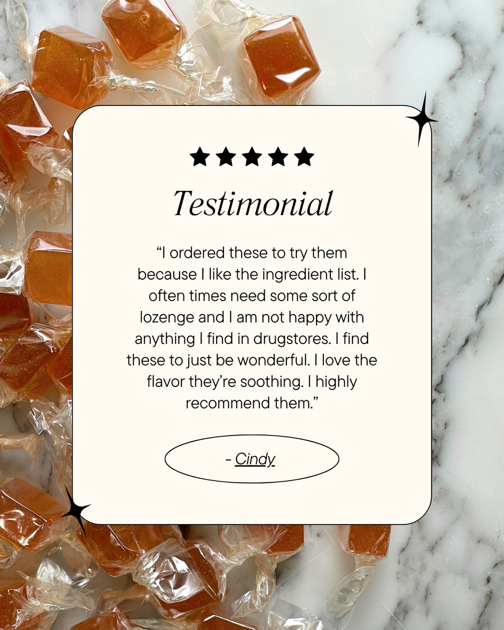 Lozenges with a testimonial card on a marble background