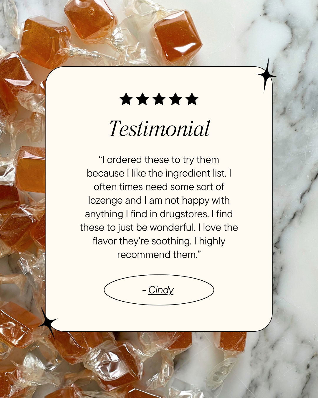 Lozenges with a testimonial card on a marble background