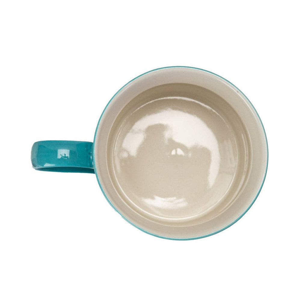Mug with turquoise handle and rim on a white background