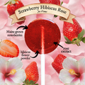 Lollipop labeled 'Strawberry Hibiscus Rose' with strawberry and flower graphics on a pink background