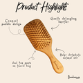 Wooden paddle brush with product highlights on a beige background