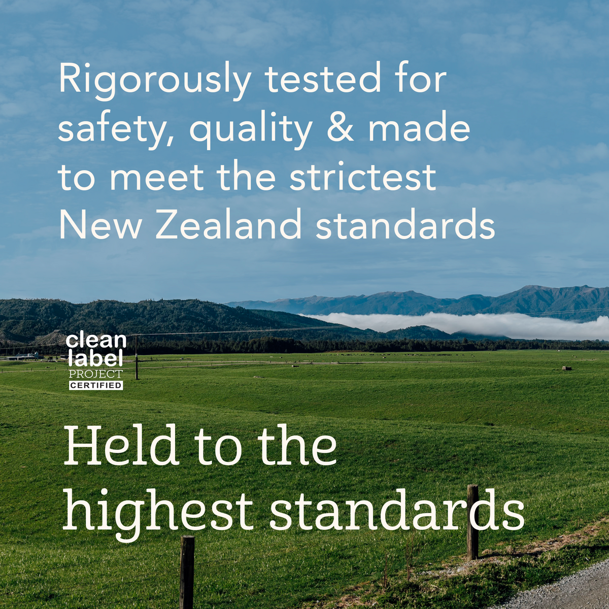 Green field with mountains in the background and text about safety, quality, and New Zealand standards.