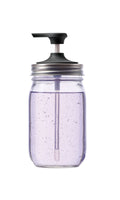 Clear mason jar with black lid and silver screw-on top on a white background