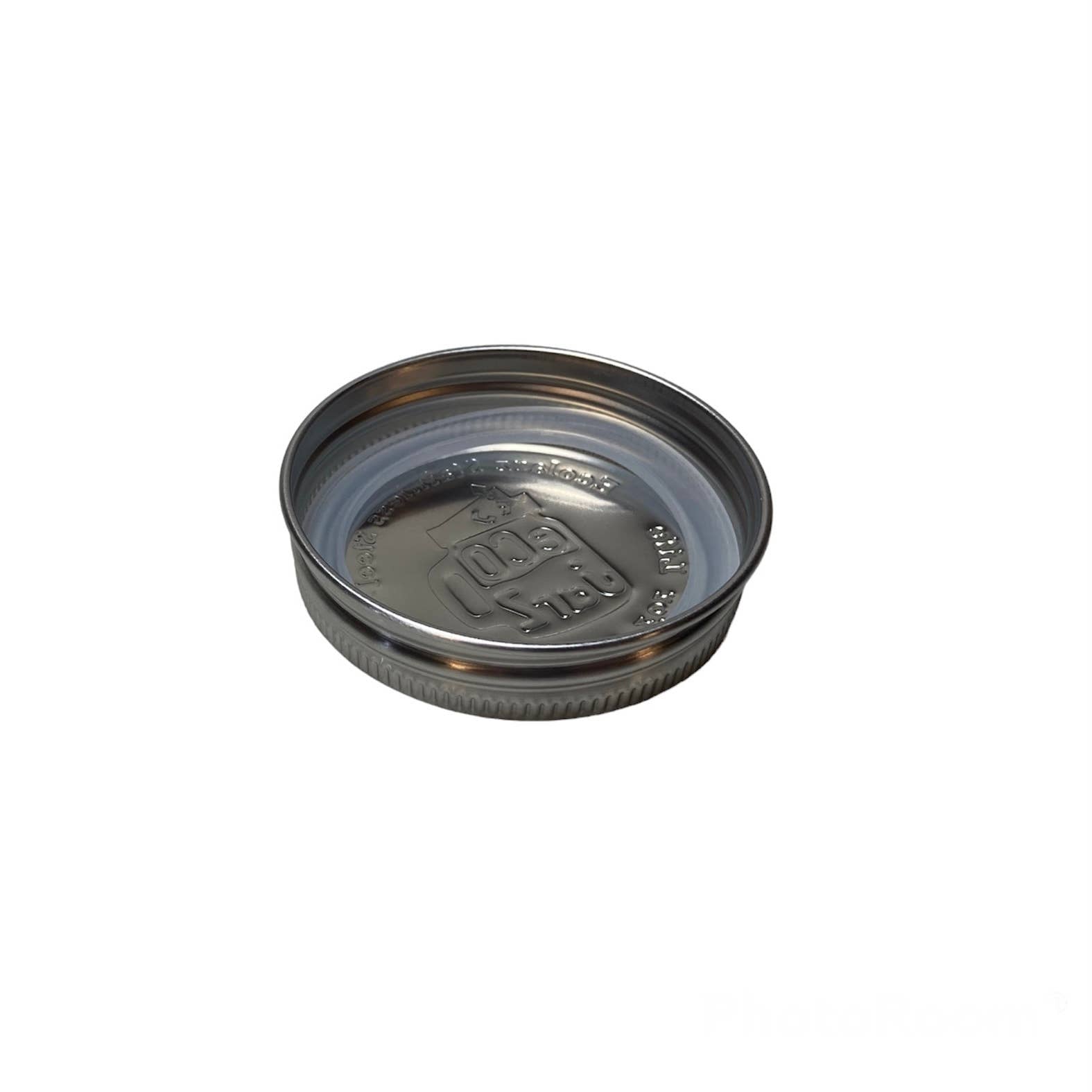 Metal jar lid on a white background