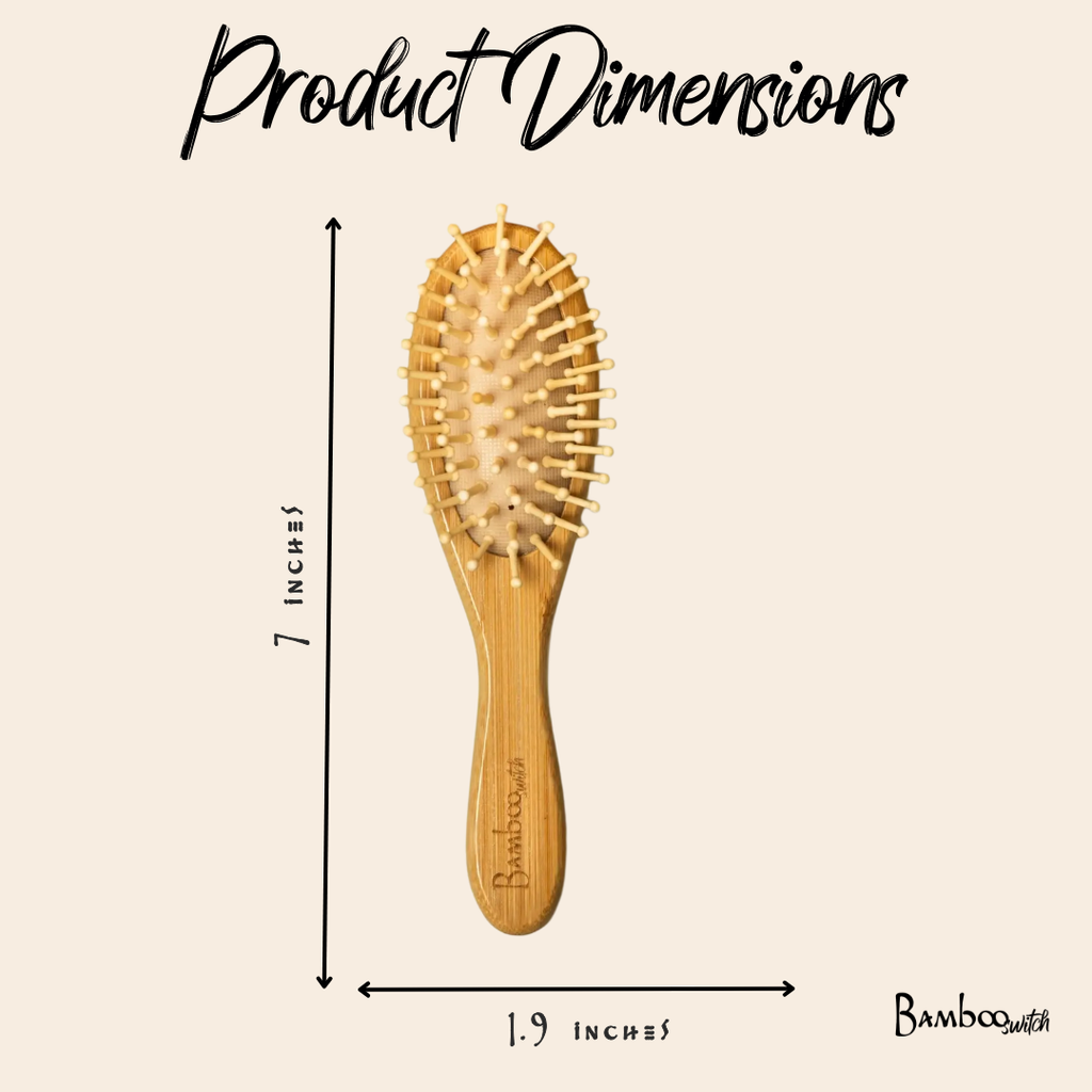 Wooden hairbrush with dimensions labeled on a beige background
