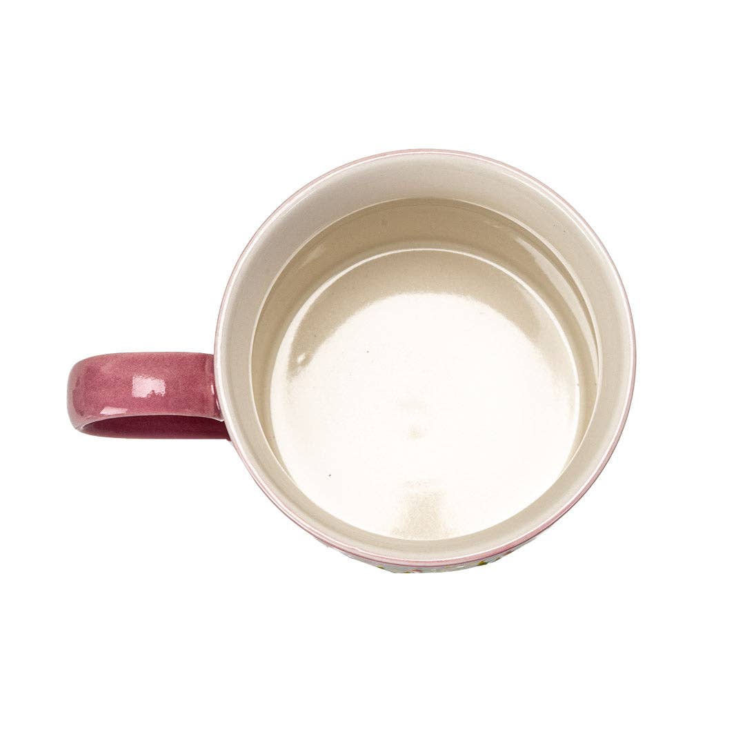 Pink mug with a white interior on a white background
