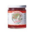 A glass jar of Portland Organic Spread Strawberry jam with a white lid and a white label featuring red strawberry graphics and the Portland brand name.
